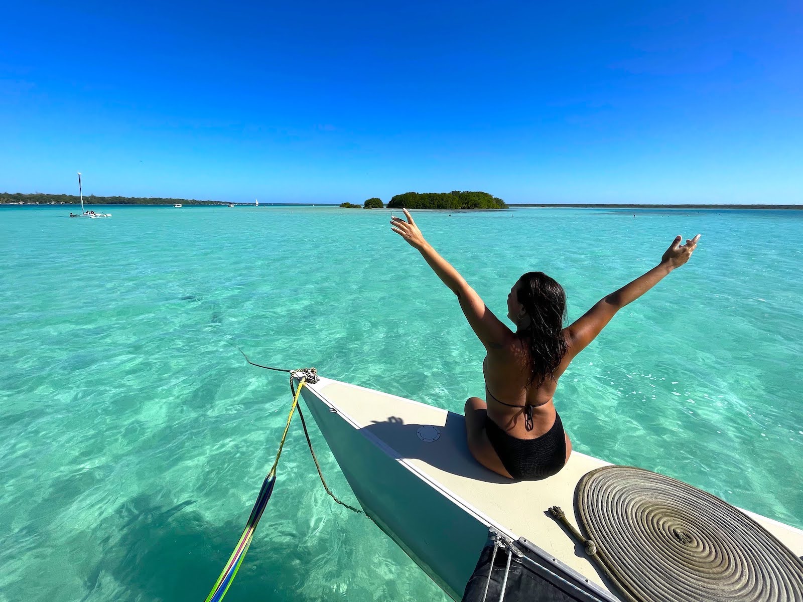 Boat navigating Bacalar Lagoon